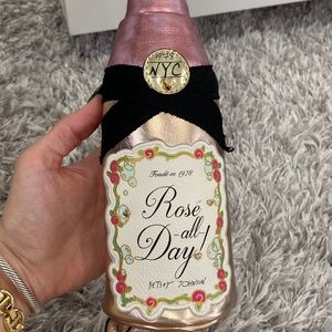 Betsey Johnson champagne bottle clutch.